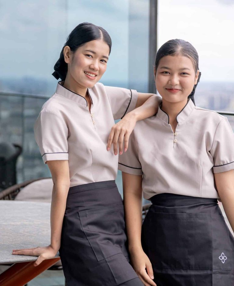 housekeeping services in Thailand, housekeepers standing on a luxury balcony